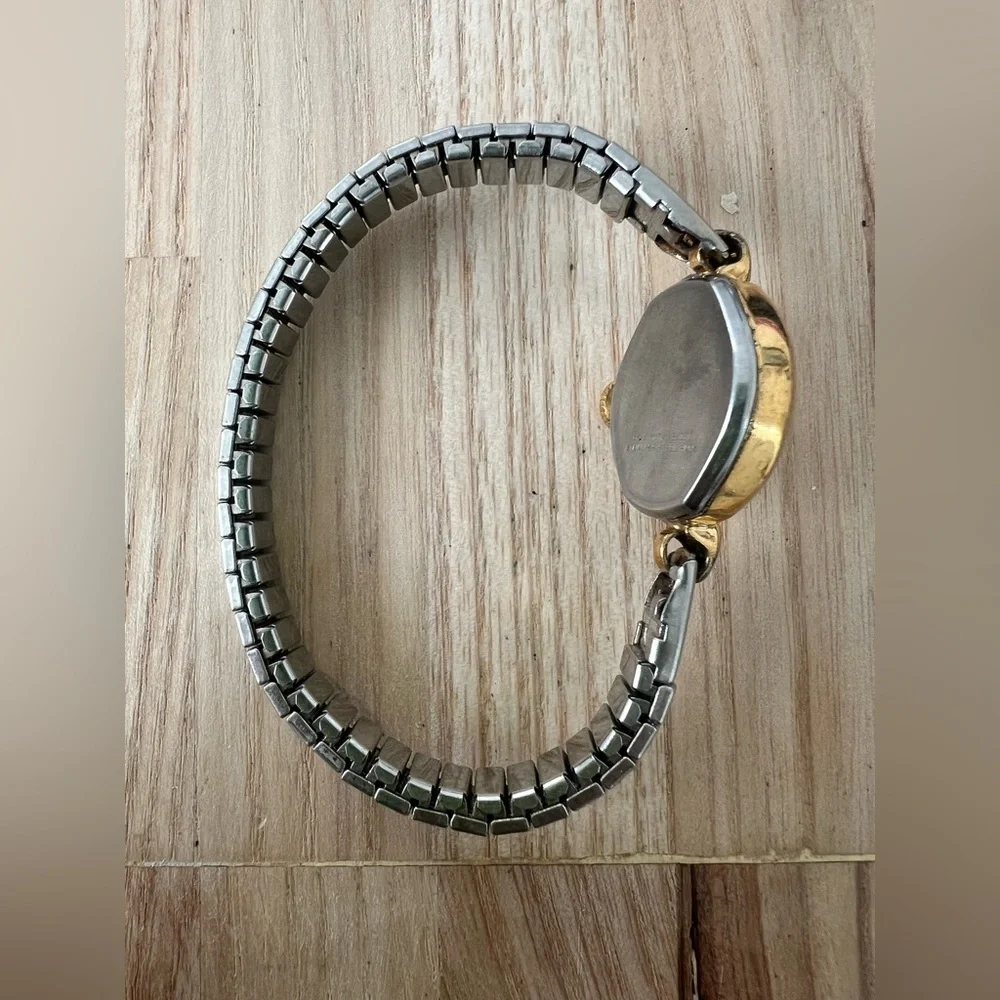Vintage Timex ladies oval two toned mechanical winding dress watch